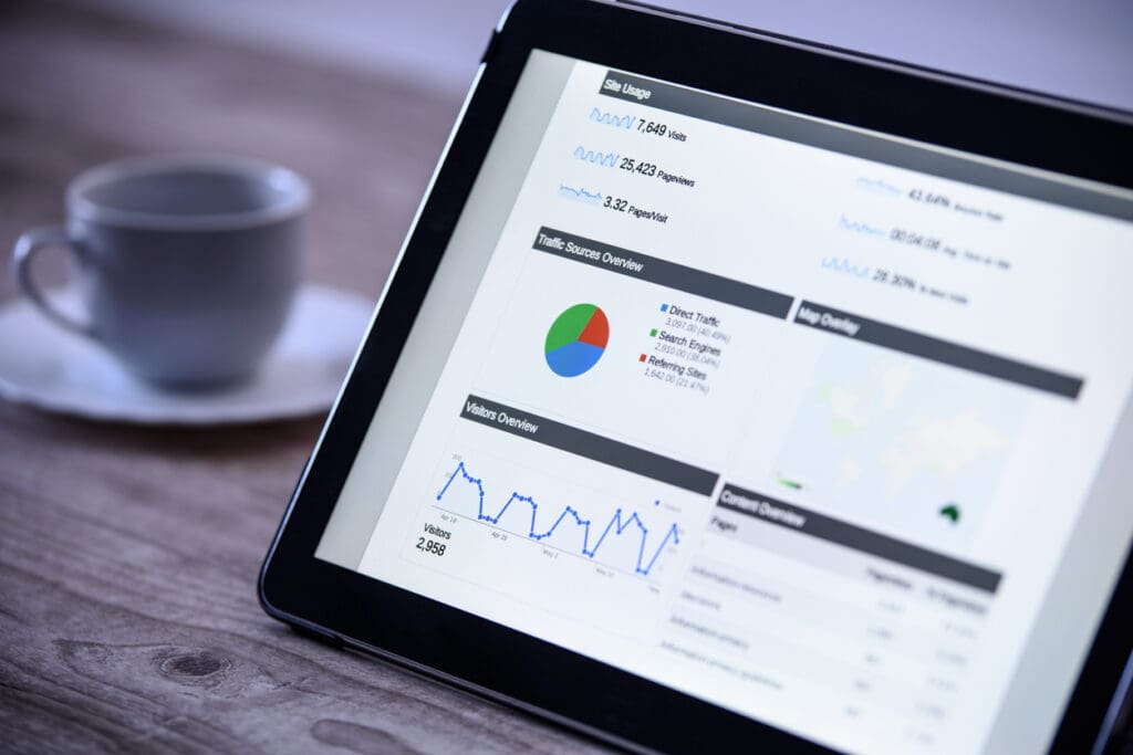 Modern digital marketing on the tablet in vintage style - Local SEO and Search Engine Marketing | FMS Online Marketing laptop screen with metrics